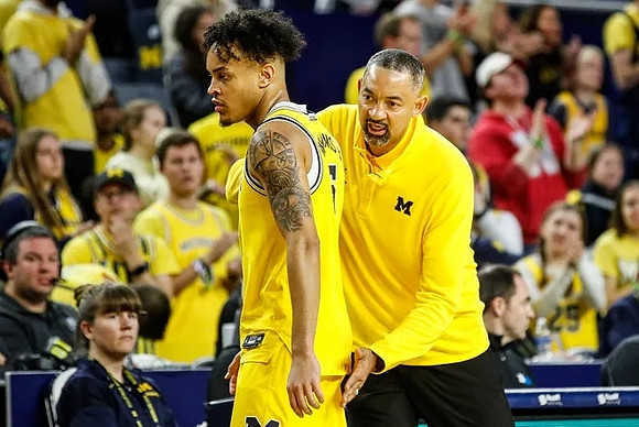 Terrance Williams II (5) and Juwan Howard