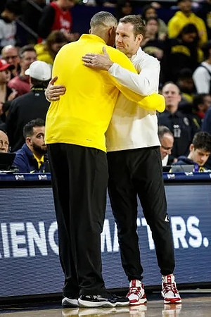 Juwan Howard and Nebraska Head Coach Fred Hoiberg