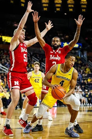Will Tschetter (42) and Nimari Burnett (4)