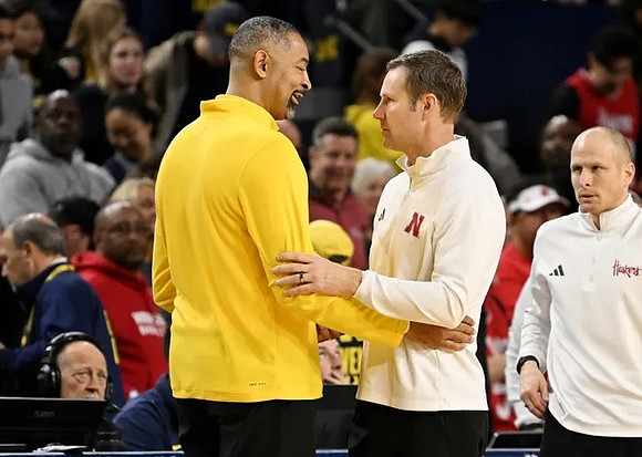 Juwan Howard and Nebraska Head Coach Fred Hoiberg