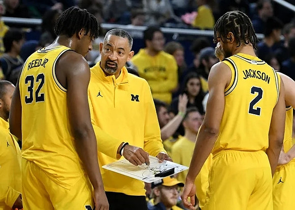 Tarris Reed Jr. (32), Juwan Howard, and Tray Jackson (2)