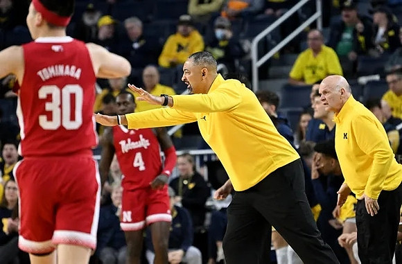 Juwan Howard and Phil Martelli