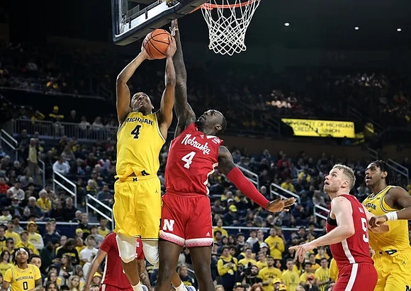 Dug McDaniel (0), Nimari Burnett (4), and Tarris Reed Jr. (32)
