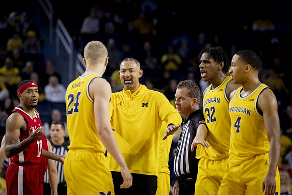 Youssef Khayat (24), Juwan Howard, Tarris Reed Jr. (32), and Nimari Burnett (4)