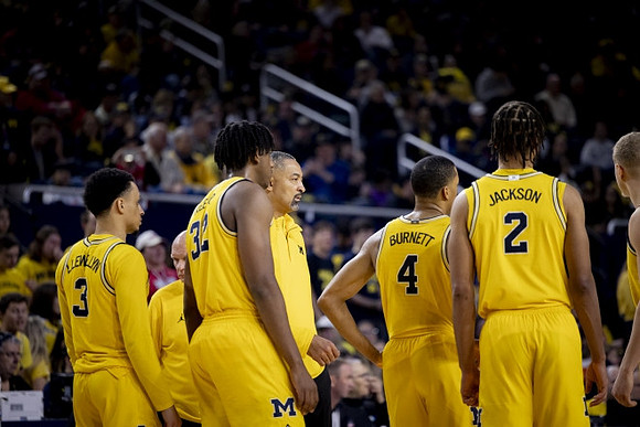 Jaelin Llewellyn (3), Phil Martelli, Tarris Reed Jr. (32), Juwan Howard, Nimari Burnett (4), Tray Jackson (2), and Youssef Khayat (24)