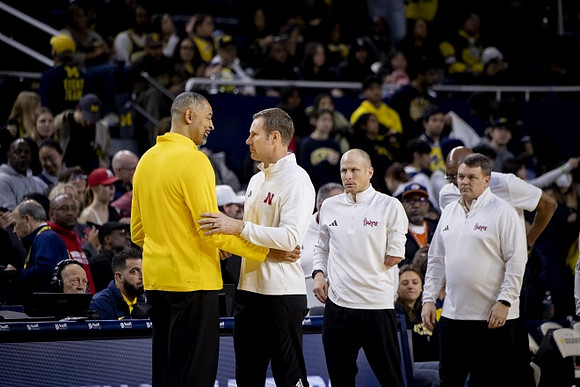 Juwan Howard and Nebraska Head Coach Fred Hoiberg