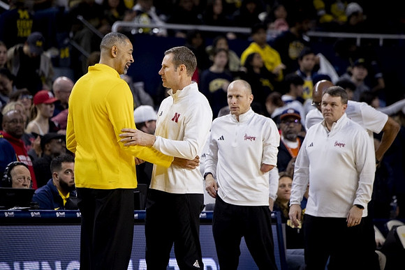 Juwan Howard and Nebraska Head Coach Fred Hoiberg