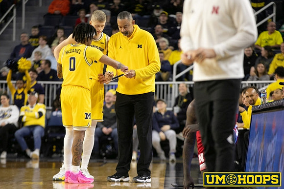 Dug McDaniel (0), Youssef Khayat (24), and Juwan Howard