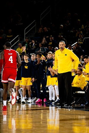Juwan Howard and Michigan Team
