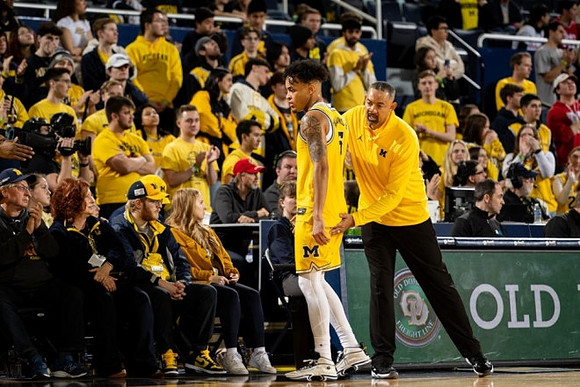 Terrance Williams II (5) and Juwan Howard