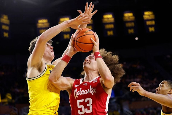 Will Tschetter (42) and Nimari Burnett (4)
