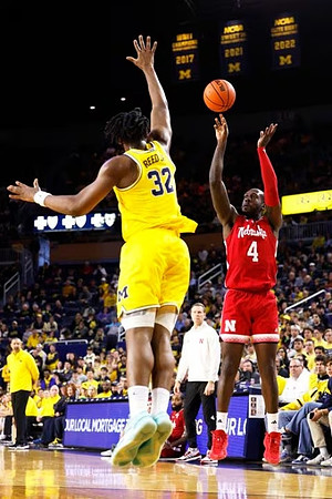 Juwan Howard, Tarris Reed Jr. (32), and Nebraska Head Coach Fred Hoiberg