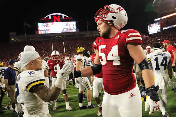 Blake Corum (2) and Quinten Johnson (14)
