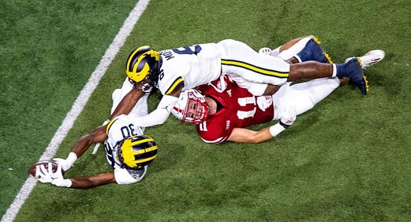 Daxton Hill (30) and R.J. Moten (6)