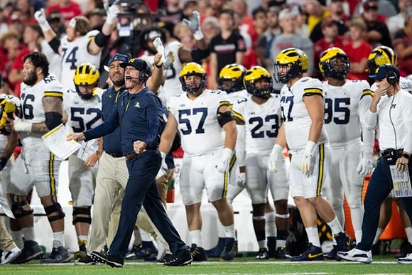Jim Harbaugh and Michigan Team