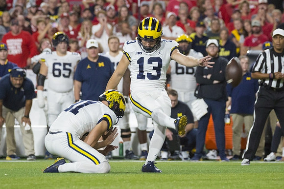 Brad Robbins (91) and Jake Moody (13)