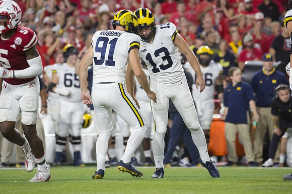 Brad Robbins (91) and Jake Moody (13)