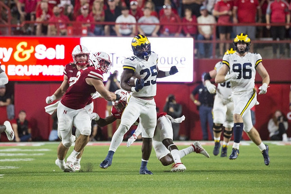 Hassan Haskins (25) and Luke Schoonmaker (86)