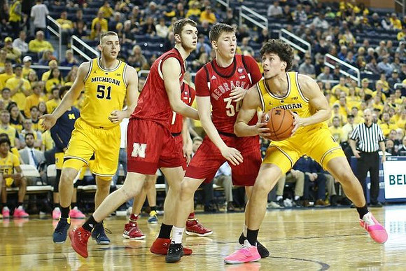 Austin Davis (51) and Brandon Johns Jr. (23)