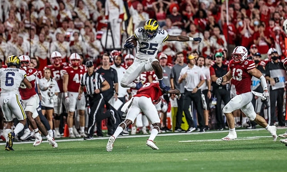 Cornelius Johnson (6) and Hassan Haskins (25)
