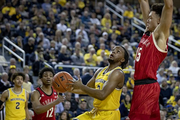 Zavier Simpson (3) and Jordan Poole (2)