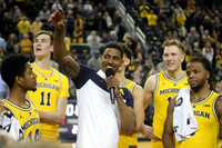 Charles Matthews (1) and Michigan Team