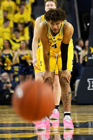 Isaiah Livers (4) and Ignas Brazdeikis (13)