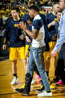 Charles Matthews (1) and Michigan Team