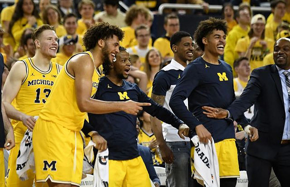 Ignas Brazdeikis (13), Isaiah Livers (4), Zavier Simpson (3), Charles Matthews (1), Jordan Poole (2), and Deandre Haynes