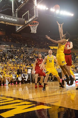 Austin Davis (51) and Rico Ozuna-Harrison (14)