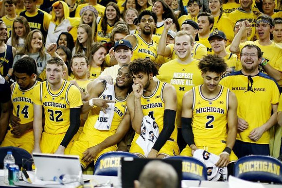 Rico Ozuna-Harrison (14), Luke Wilson (32), Zavier Simpson (3), Isaiah Livers (4), and Jordan Poole (2)