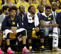 Jordan Poole (2), Zavier Simpson (3), and Charles Matthews (1)