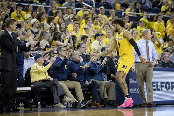 Luke Yaklich, Jim Harbaugh, Isaiah Livers (4), and John Beilein