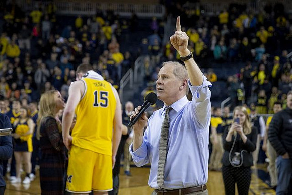 Jon Teske (15) and John Beilein
