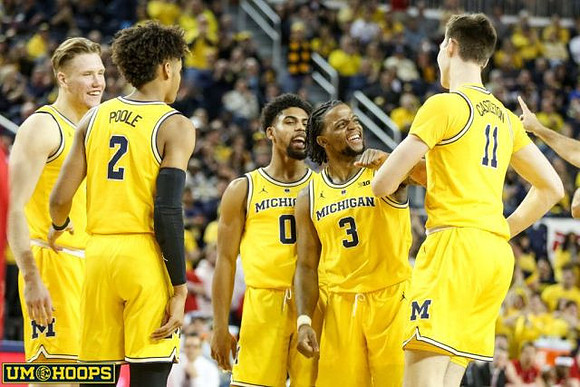 Ignas Brazdeikis (13), Jordan Poole (2), David DeJulius (0), Zavier Simpson (3), and Colin Castleton (11)