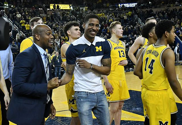 Deandre Haynes, Charles Matthews (1), and Michigan Team