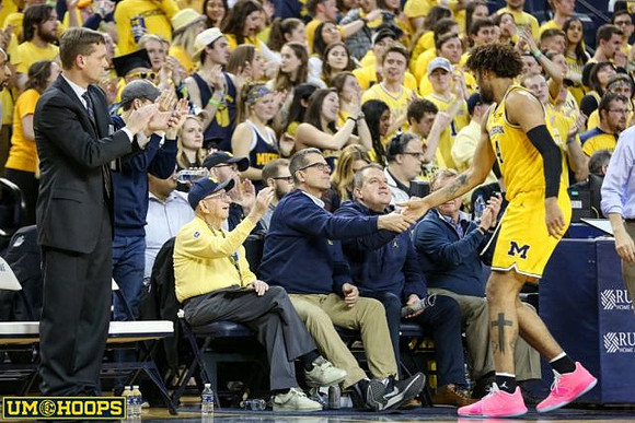 Luke Yaklich, Jim Harbaugh, and Isaiah Livers (4)