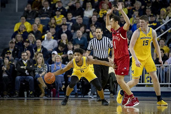 David DeJulius (0) and Jon Teske (15)