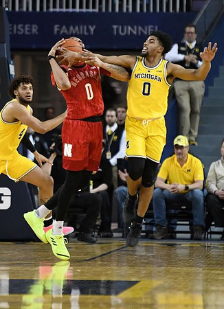 Isaiah Livers (4) and David DeJulius (0)