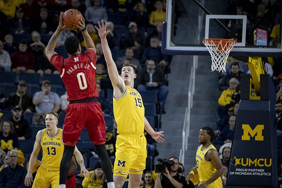 Ignas Brazdeikis (13), Jon Teske (15), and Zavier Simpson (3)