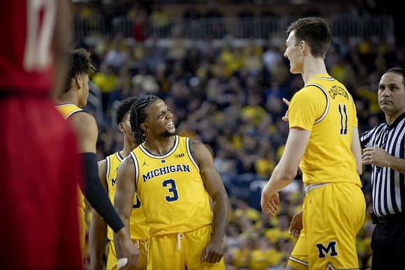 Zavier Simpson (3) and Colin Castleton (11)