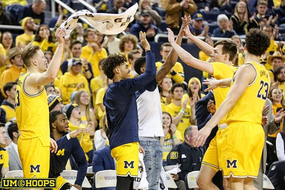 Ignas Brazdeikis (13), Jordan Poole (2), Charles Matthews (1), Colin Castleton (11), and Brandon Johns Jr. (23)