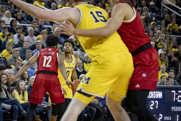 David DeJulius (0) and Jon Teske (15)