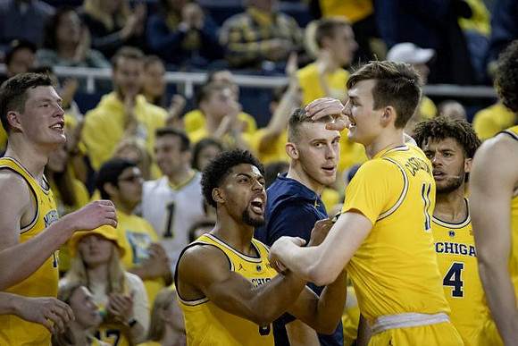 Jon Teske (15), David DeJulius (0), Austin Davis (51), Colin Castleton (11), and Isaiah Livers (4)