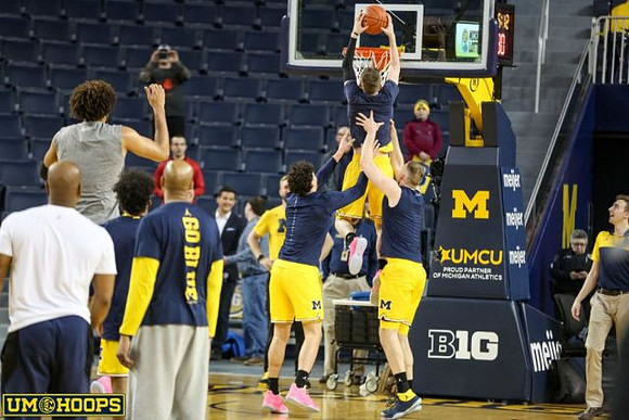 Isaiah Livers (4), Brandon Johns Jr. (23), Austin Davis (51), and Luke Wilson (32)