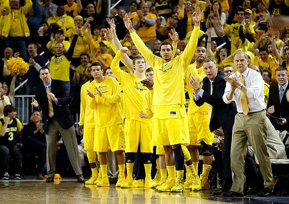 Josh Bartelstein (20), Matt Vogrich (13), Spike Albrecht (2), Jordan Morgan (52), Jon Horford (15), Jeff Meyer, and John Beilein