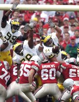 Pierre Woods (99), Gabe Watson (78), and Pat Massey (4)