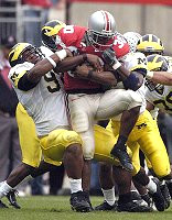 Pierre Woods (99), Shawn Crable (2), and Scott McClintock (36)