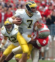 Chad Henne (7) and  Kevin Dudley (32)