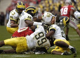 Grant Mason (13), Prescott Burgess (6), Pierre Woods (99), Leon Hall (29),and Ernest Shazor (25)